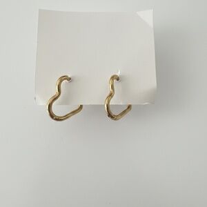 Gold tone heart shaped earrings
